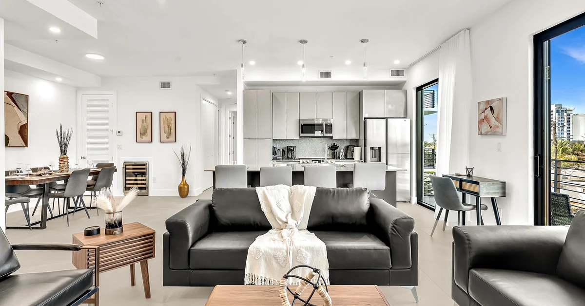 Modern open-plan luxury apartment living room with city views
