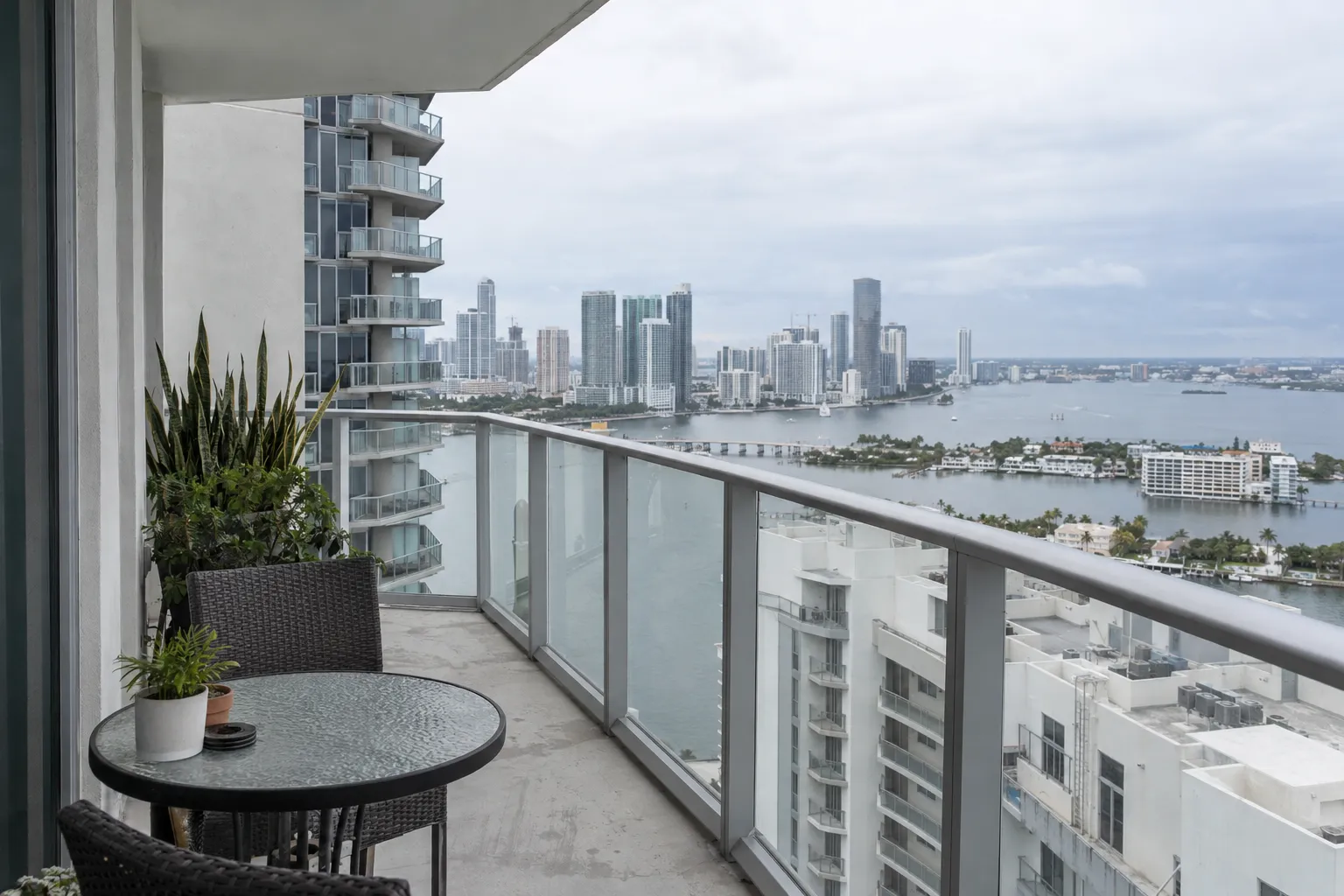 Balcony of a Miami condominium overlooking the city skyline and waterway